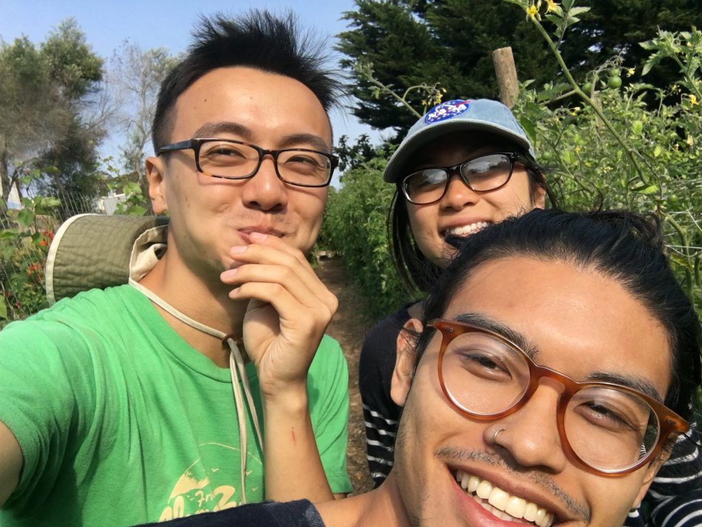 Image description: 2018 APIENC Summer Organizers (from left to right) Yuan, Paige, and Kevin are outdoors and smiling toward the camera